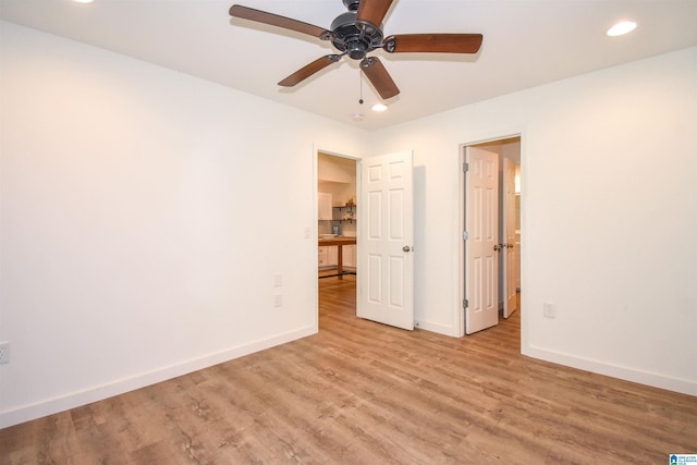 unfurnished bedroom featuring recessed lighting, baseboards, wood finished floors, and ceiling fan