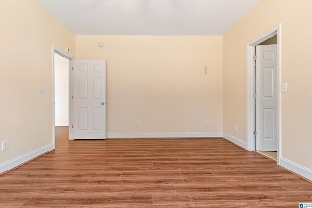 unfurnished room featuring light hardwood / wood-style floors