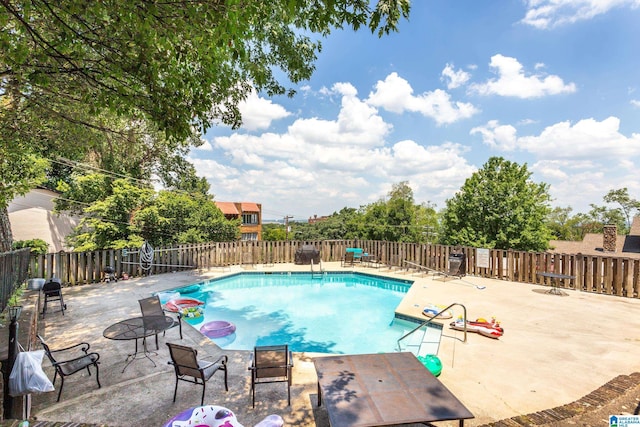 view of pool with a patio