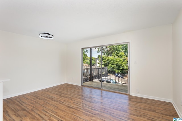 unfurnished room featuring wood-type flooring