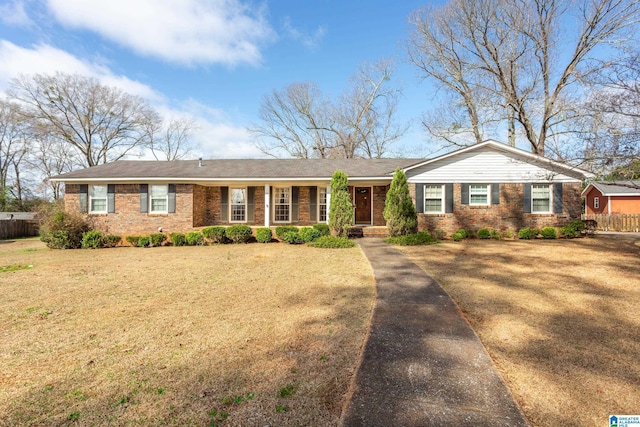 single story home with a front yard