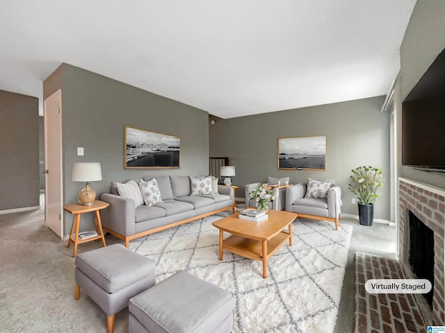 living room featuring light colored carpet and a fireplace