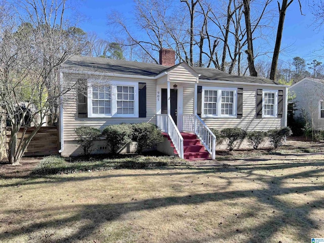 single story home with a front yard