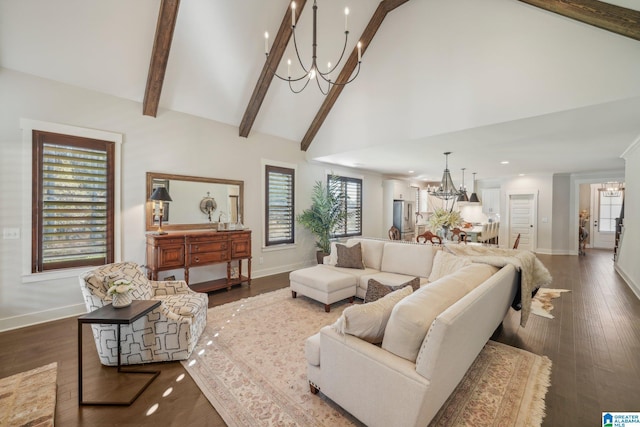 living room with dark hardwood / wood-style floors, high vaulted ceiling, a notable chandelier, and beam ceiling