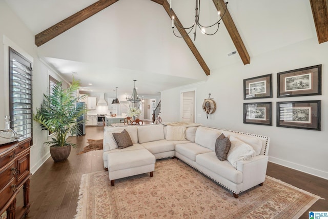 living room featuring hardwood / wood-style flooring, high vaulted ceiling, beamed ceiling, and a notable chandelier