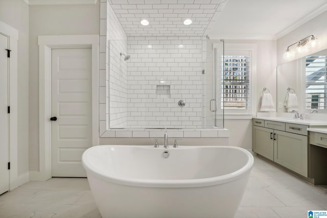 bathroom featuring independent shower and bath, vanity, and ornamental molding