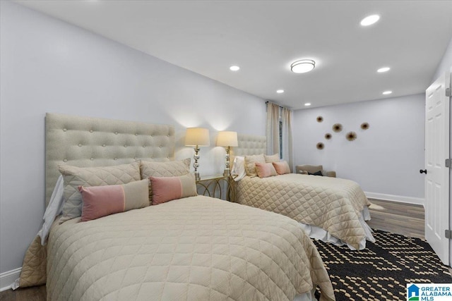 bedroom featuring hardwood / wood-style floors