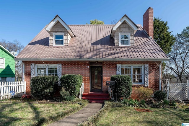 view of front of home with a front lawn