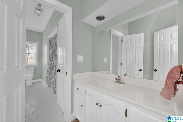 bathroom featuring visible vents, baseboards, a shower with shower curtain, toilet, and vanity