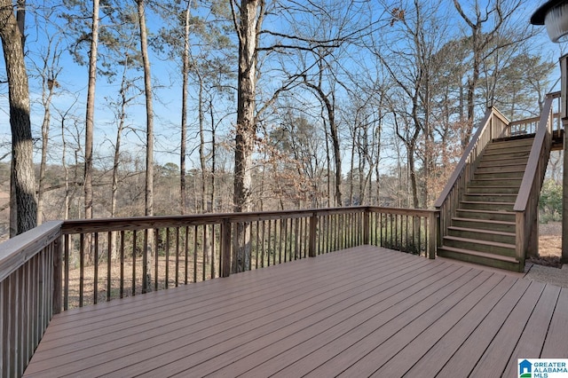 wooden terrace featuring stairs