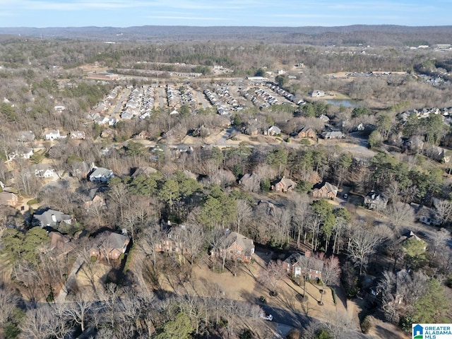 aerial view with a wooded view