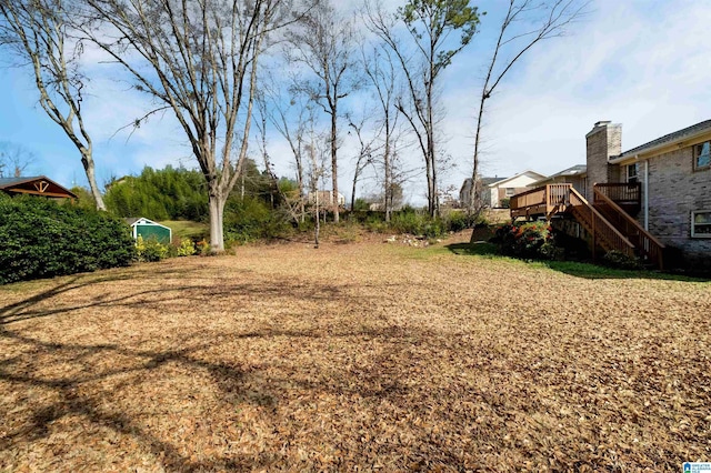 view of yard featuring a deck