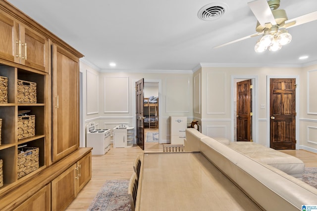 890 River Oaks Dr, Cropwell, AL 35054 - bedroom with crown molding, light wood-type flooring, visible vents, a decorative wall, and ceiling fan