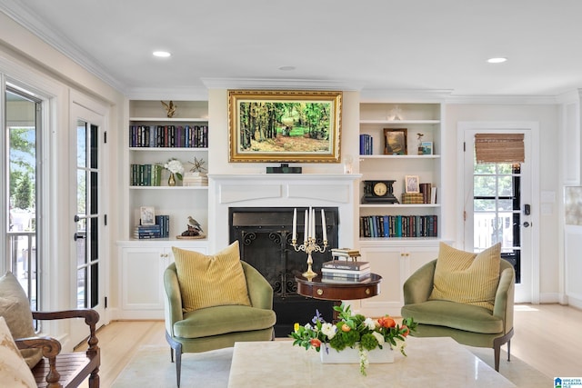 890 River Oaks Dr, Cropwell, AL 35054 - living area with recessed lighting, built in shelves, crown molding, wood finished floors, and a fireplace