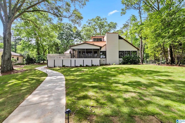 890 River Oaks Dr, Cropwell, AL 35054 - back of property with a sunroom and a yard