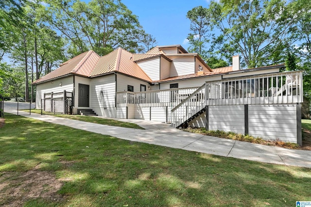 890 River Oaks Dr, Cropwell, AL 35054 - view of front facade featuring a chimney, fence, metal roof, a front lawn, and stairway