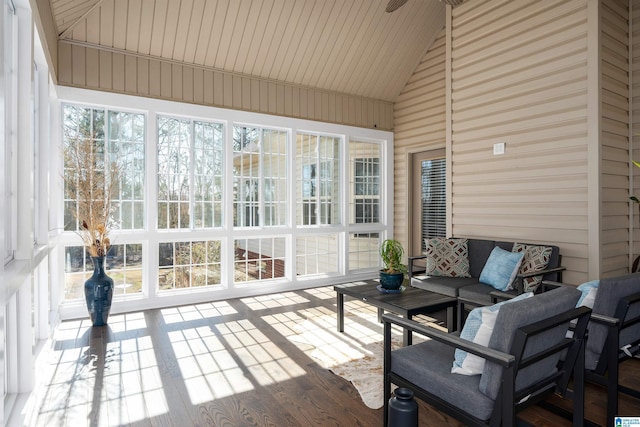 sunroom / solarium with vaulted ceiling and ceiling fan