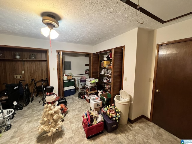 interior space with a textured ceiling