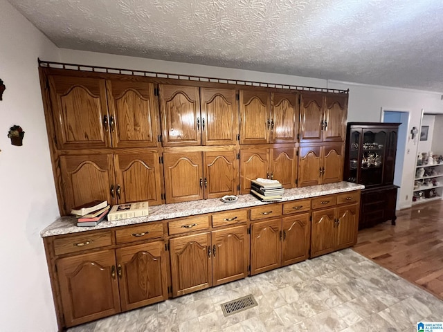 kitchen with a textured ceiling