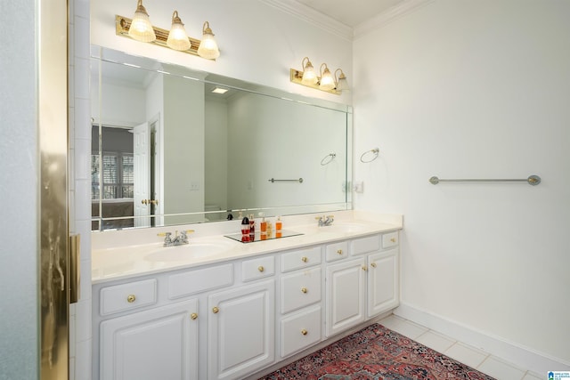 full bath featuring double vanity, crown molding, and a sink