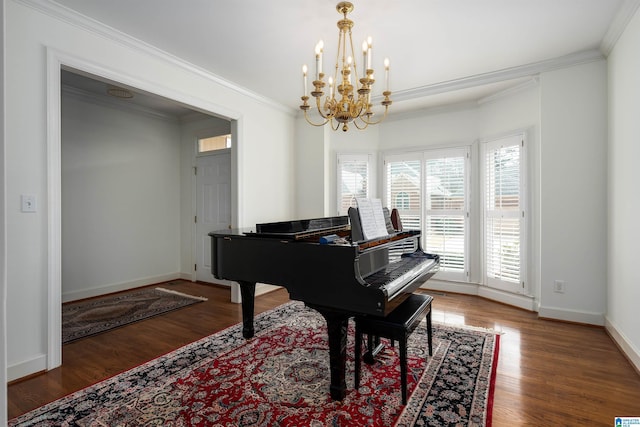 sitting room featuring crown molding, baseboards, and wood finished floors