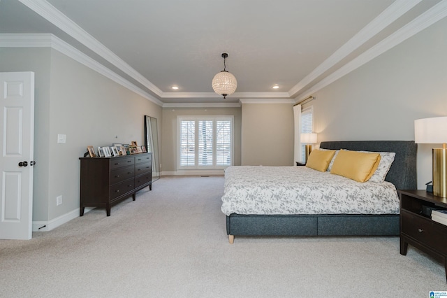 bedroom with ornamental molding, baseboards, a raised ceiling, and light colored carpet