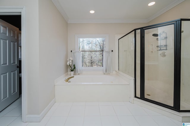 full bathroom featuring ornamental molding, tile patterned flooring, a garden tub, and a stall shower