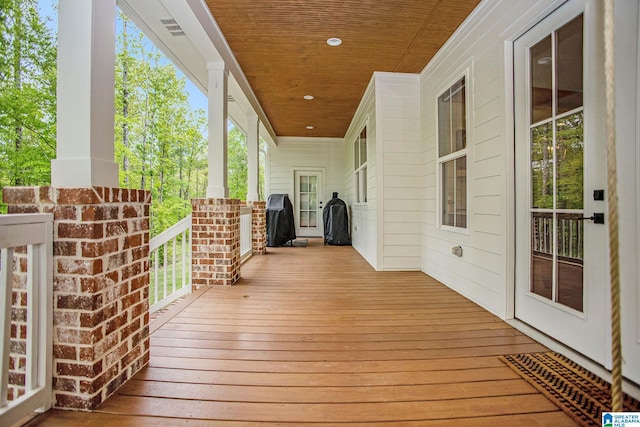 wooden terrace with covered porch