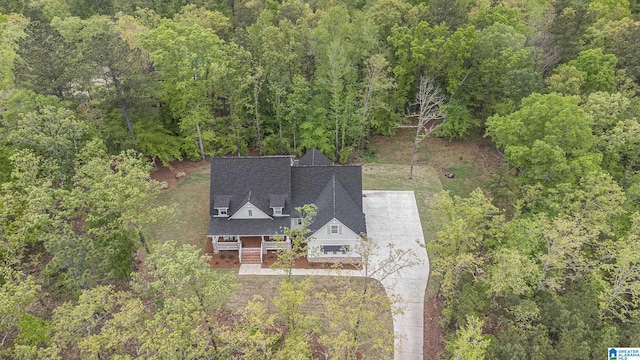 aerial view with a wooded view