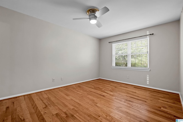 spare room with ceiling fan and light hardwood / wood-style flooring