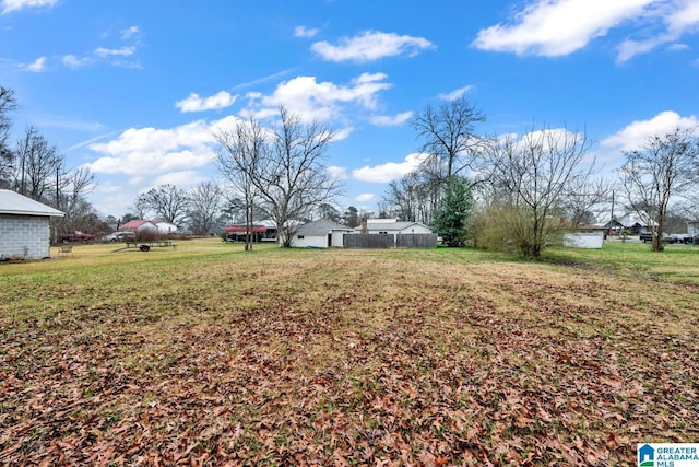 view of yard featuring fence