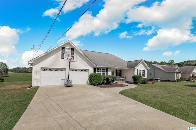 view of front of property featuring a front yard and a garage