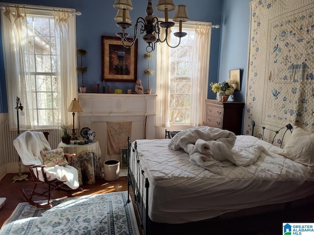 bedroom featuring a chandelier