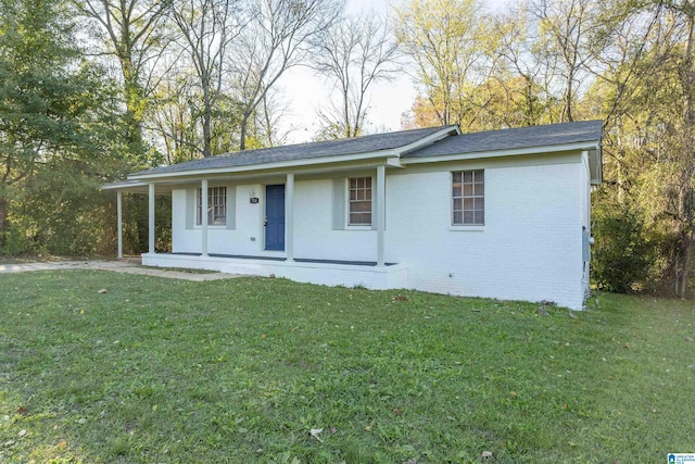 ranch-style house with a front lawn and a porch