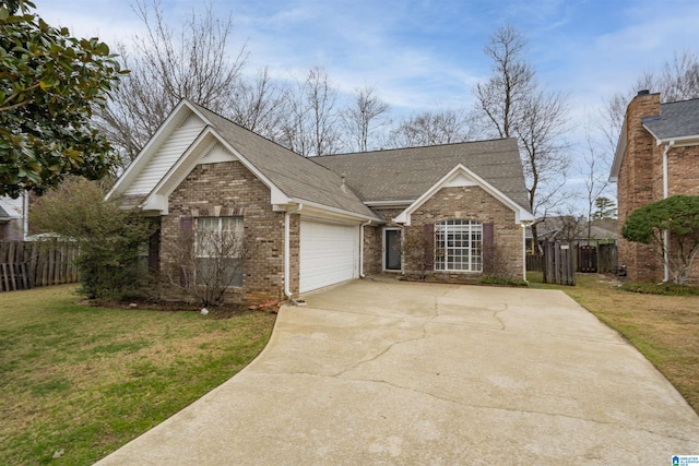 view of front of house with a garage and a front lawn