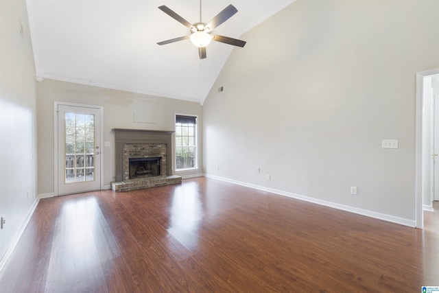 unfurnished living room featuring a fireplace, high vaulted ceiling, dark hardwood / wood-style flooring, and ceiling fan