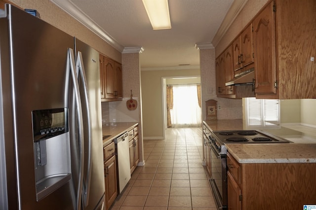 kitchen with crown molding, light tile patterned floors, stainless steel appliances, and tasteful backsplash