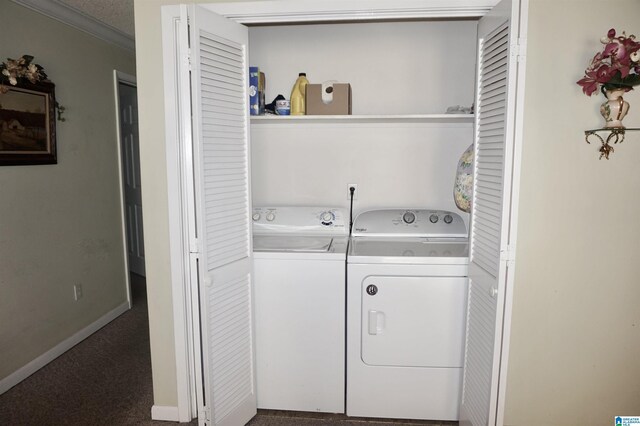 washroom with carpet floors and washer and clothes dryer