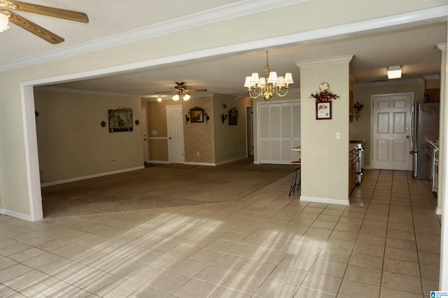 empty room with ceiling fan with notable chandelier, light colored carpet, and ornamental molding