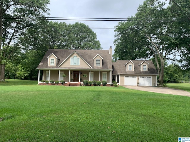 view of front of house featuring concrete driveway, a chimney, a porch, an attached garage, and a front lawn