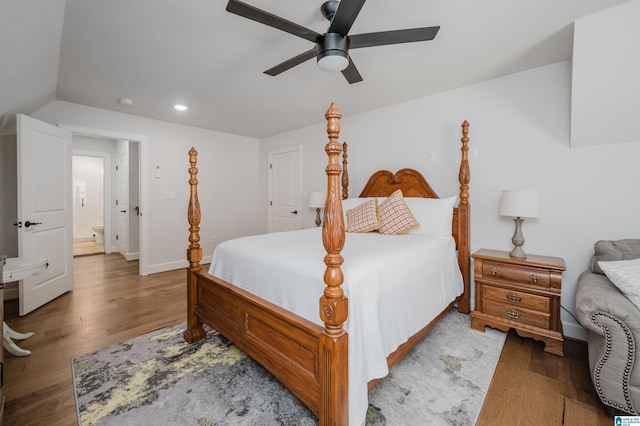 bedroom featuring ceiling fan, baseboards, wood finished floors, and recessed lighting