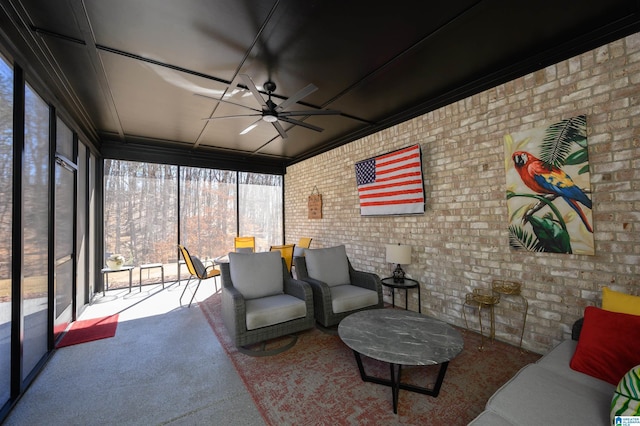 sunroom / solarium with ceiling fan