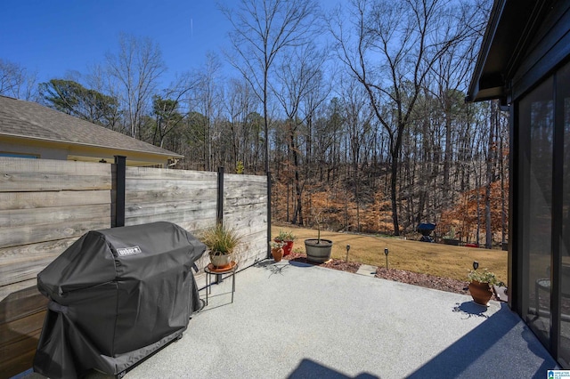 view of patio / terrace with fence and area for grilling