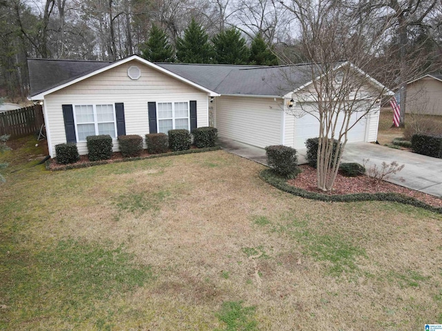 ranch-style home featuring an attached garage, driveway, a front lawn, and fence