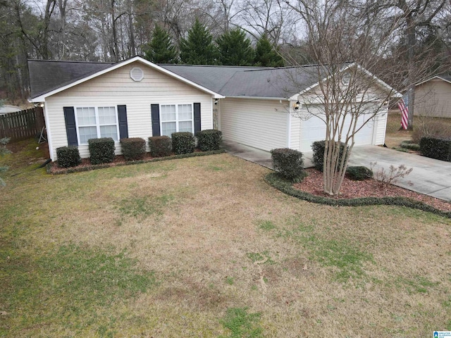 ranch-style home featuring a front lawn and a garage