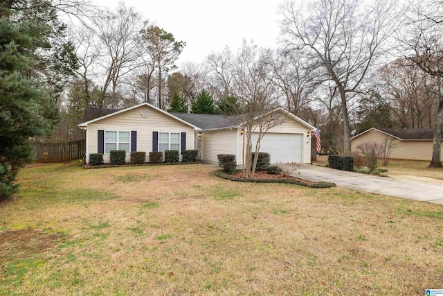 ranch-style house featuring a front yard and a garage