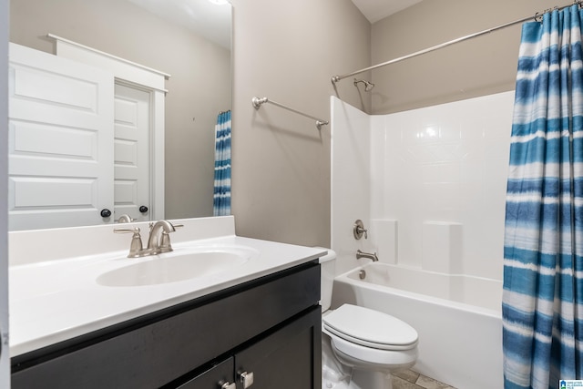 bathroom featuring shower / tub combo with curtain, vanity, and toilet