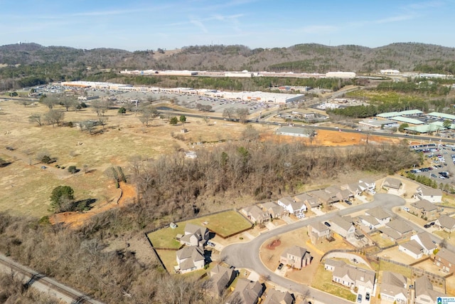 drone / aerial view featuring a mountain view and a residential view