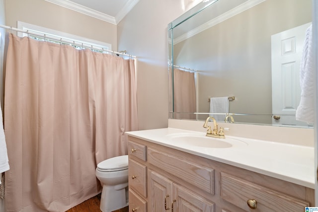 bathroom featuring crown molding, toilet, vanity, wood finished floors, and a shower with curtain