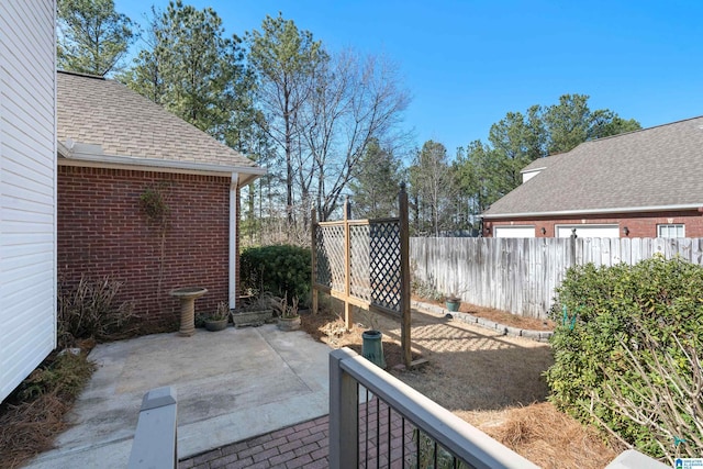 view of patio with fence